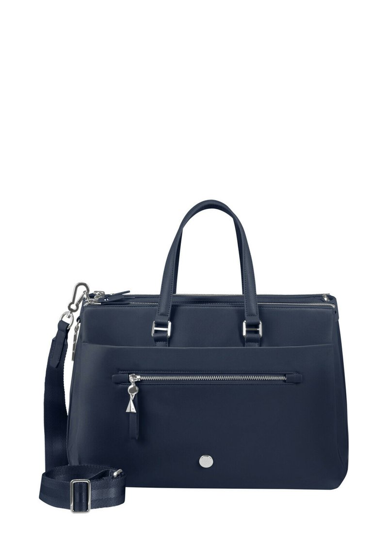 Navy handbag made of textured material, featuring two handles, a detachable strap, front zip pocket, and silver-tone hardware accents.