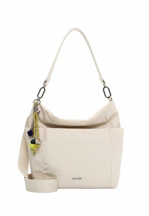 Beige skuldertaske med justerbar rem, dekorative knuder og perler på siden, frontlogo "SURI FREY" og blød stoftekstur.