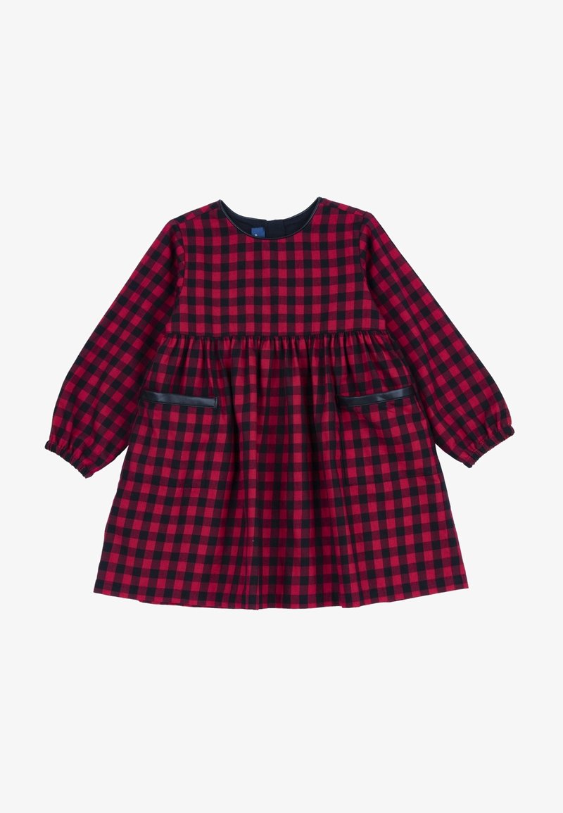 Vestido a cuadros rojo y negro con mangas largas, cuello redondo y dos bolsillos laterales. Presenta una cintura fruncida para una forma acampanada.
