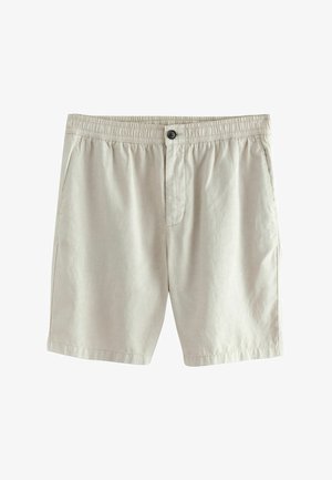 Beżowe szorty wykonane z lekkiego materiału, z elastycznym paskiem w talii, przednimi kieszeniami oraz zapięciem na guzik. Gładka faktura i dopasowany krój.