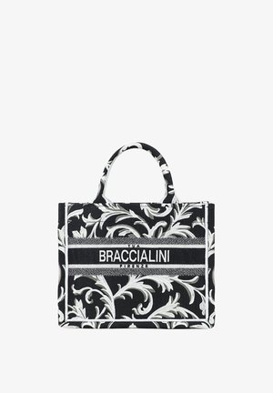 Borsa tote con motivo floreale in bianco e nero, dotata di due manici e con la scritta "Tua Braccialini Firenze" sulla fascia centrale anteriore.