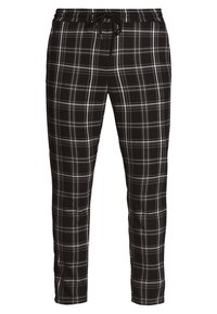 Zwart-witte geruite drawstring broek met een slim fit en een elastische tailleband.