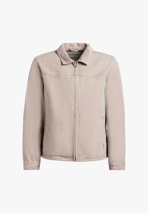 Hellbeige Reißverschlussjacke mit traditionellem Kragen und langen Ärmeln, versehen mit dezenten Steppnähten an Brust und Seiten.