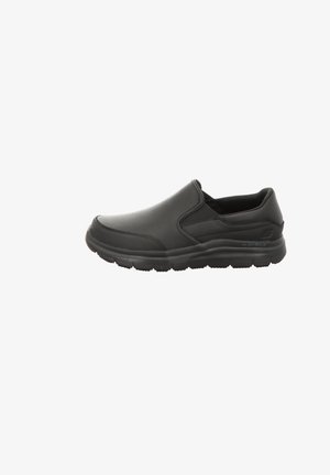Zapatos negros sin cordones con un upper sintético suave, suela acolchada y paneles elásticos en los laterales para facilitar el uso y mejorar la comodidad.