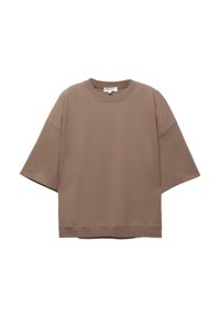 Smeđi oversized T-shirt, kratki rukavi, okrugli izrez, napravljen od mekog pamučnog materijala, sadrži jednostavan dizajn i minimalne šavove.