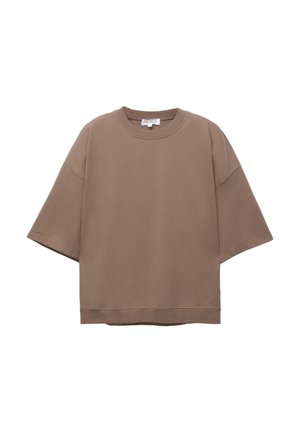 Tricou brown supradimensionat, cu mâneci scurte, decolteu rotund, realizat din material de bumbac moale, cu un design simplu și ș seamă minimă.