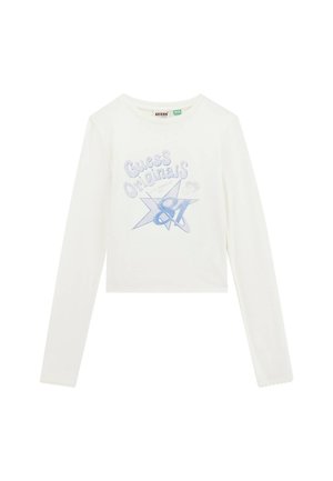 Crop top lungo a maniche bianche con testo grafico blu "Guess Originals" e design a stella. Materiale in cotone morbido con dettagli a orlo scallop.