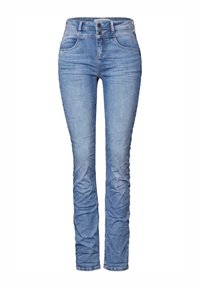 Vaaleansiniset farkut, slim fit -mallia, joissa on sileä pinta, kaksi nappia vyötäröllä ja etutaskut. Haalistuneet alueet antavat kuluneen ilmeen.