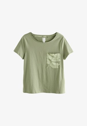 Gai zaļš īsām piedurknēm T-krekls, izgatavots no mīksta auduma, ar krūšu kabatu ar caurspīdīgu ziedu rakstu. Apaļš dekoltē.