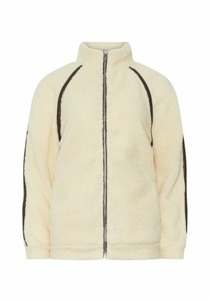 Giacca in pile color crema con zip frontale integrale e piping marrone scuro lungo le maniche e i lati, con colletto a imbuto.