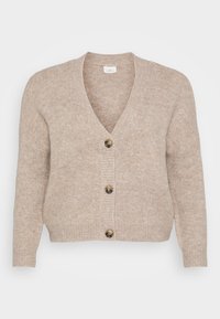 Béžový pletený cardigan s výstřihem do V, pěti hnědými knoflíky vpředu a žebrovanými manžetami. Měkká textura s volným střihem.
