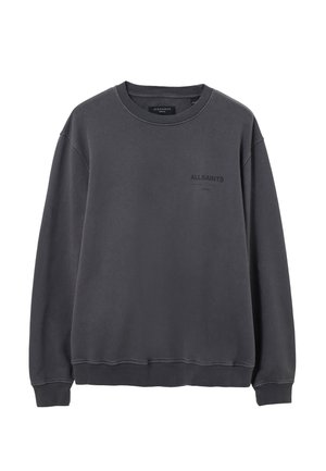 Grijze sweatshirt met lange mouwen, geribbelde manchetten en tailleband. Heeft een ronde hals en subtiele branding op de borst. Zachte textuur.