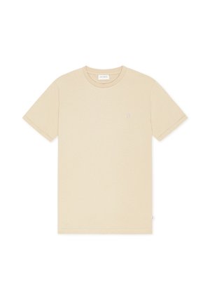 T-shirt beige à manches courtes avec col rond et petit logo sur la poitrine gauche, design épuré, posé à plat sur fond blanc.