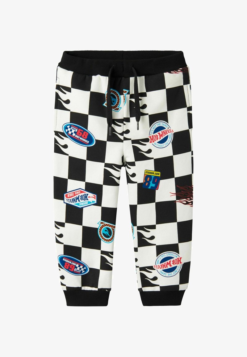Pantalons de survêtement à carreaux noir et blanc avec des flammes, arborant des logos et des accents colorés de Hot Wheels. Ceinture élastique avec cordon de serrage.