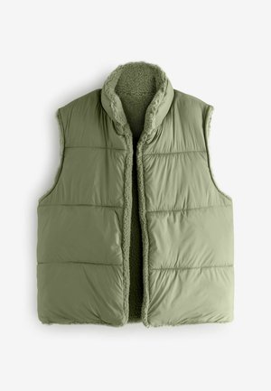 Chaleco verde acolchado con un alto collar, diseño sin mangas y textura interna suave. Presenta secciones cosidas y un borde ligeramente peludo.