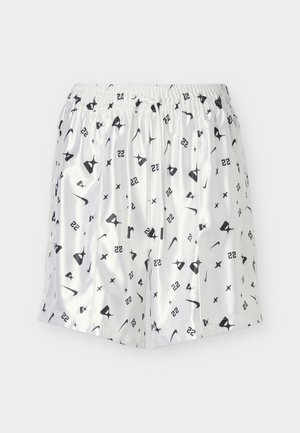 Witte shorts met een elastische tailleband met zwarte abstracte symbolen, cijfers en swoosh-patronen over de hele stof.