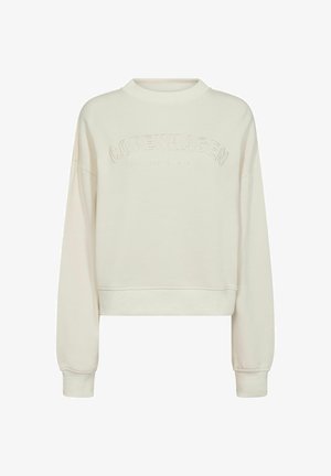 Kreemi värvi lühikesed varrukad sweatshirt, millel on soonikkoes krae, langenud õlad ja reljeefselt tekst "COPENHAGEN" esipaneelil. Sile tekstuur.
