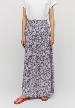 Jupe maxi en tissu rose clair avec un motif floral bleu foncé, dotée d'une taille élastique et d'un détail de lien sur le côté.