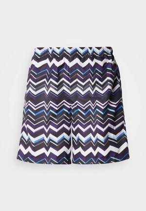Swimming shorts with a zigzag pattern in black, purple, white, and blue. Features an elastic waistband for comfort and flexibility.