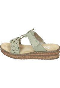 Light green leather sandals with woven upper design, cushioned footbed, and a stacked cork sole. Accented with a decorative loop detail.