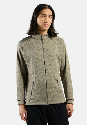 Giacca zip-up verde melange con colletto alto, due tasche laterali, maniche lunghe e polsini a coste, realizzata in un morbido tessuto testurizzato.