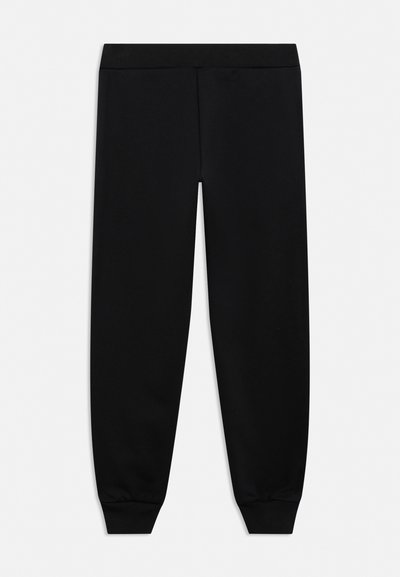Pantalon de jogging noir slim avec taille et poignets élastiques, présenté sur un fond clair uni.