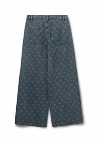 Denim culottes i blå med et diamantmønster, to baglommer og et vidt ben med en kant, der falder under læggen.