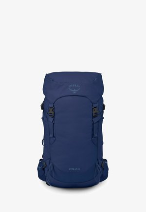 Donkerblauwe Osprey Kyte LT 28 wandelrugzak met bovenklep, gespsluitingen, zijriemen en gevoerde heupbandzakken.