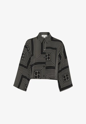 Schwarzes, gekürztes Shirt mit einem geometrischen Muster aus weißen Linien, durchgehende Knopfleiste und Kragen sowie drei Viertel lange Ärmel.