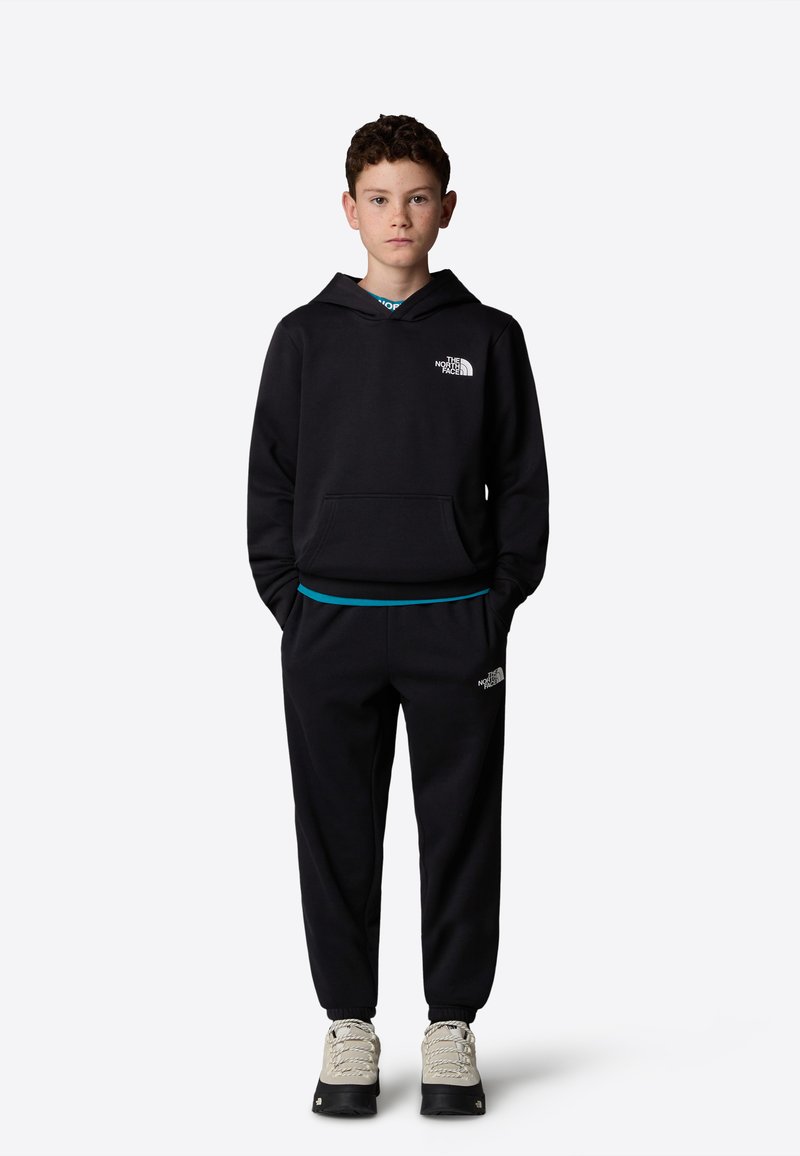 The North Face - REGULAR TAPERED JOGGERS UNISEX - Pantalon de survêtement - tnf black, Agrandir