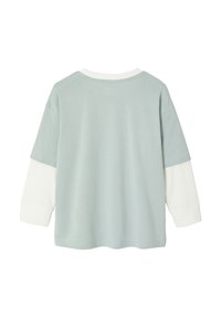 Helles grünes Langarmoberteil mit weißen Ärmeln. Runde Ausschnittform mit geripptem Besatz. Weiches Baumwollmaterial, lockere Passform, flache Nähte.