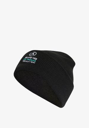 Black knit beanie featuring embroidered logo in white and teal for the Mercedes AMG Petronas Formula 1 Team. Textured material, snug fit.