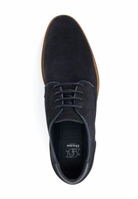 Black suede dress shoe with a round toe, featuring a single stitched design and black laces, set on a brown rubber sole.