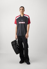 Puma FOOTBALL UNISEX - Triko s potiskem - black