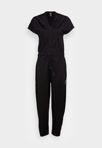 Svart jumpsuit i lättviktsmaterial med v-ringning, korta ärmar, dragsko i midjan, två fickor och avsmalnande ben.