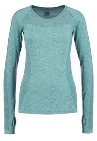 Długorękawowy sportowy top w melanżowym odcieniu teal, z teksturowanym yoke, otworami na kciuki w mankietach oraz dopasowanym kształtem, który wspomaga ruch.