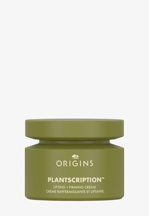 Groene cilindrische pot met een matte afwerking, voorzien van witte tekst met de labels "Origins" en "Plantscription", en een strak sluitend deksel.