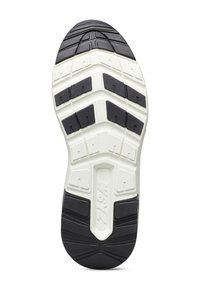 Semelle en caoutchouc blanc et noir d'une chaussure de sport avec des rainures et des motifs de semelle en relief, arborant le logo "W6YZ" au centre.