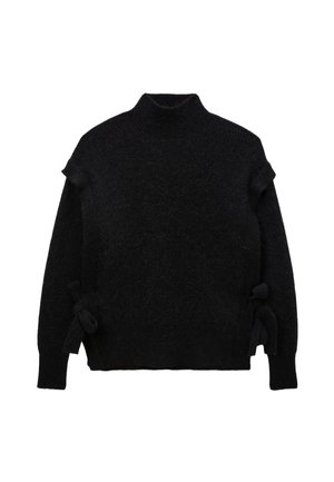Pull en tricot noir avec un col montant, doté de lacets latéraux, d'un tissu texturé et d'une coupe décontractée. Détails froncés discrets aux épaules.