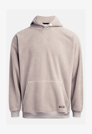 Pulover iz flisa svetlo sive barve, z sprednjim žepom, ribastim robom in nastavljivo kapuco skladko z vrvico. Mehka tekstura z minimalnimi detajli.