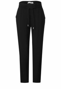 Zwarte joggers met een elastische tailleband en trekkoord. Voorzien van zijzakken en taps toelopende pijpen voor een comfortabele pasvorm. Gladde textuur.