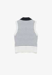 Sleevless sweater i hvid med marineblå vandrette striber, ribbet struktur og en rund krave. Har et tætsiddende design med en ensfarvet hvid kant.
