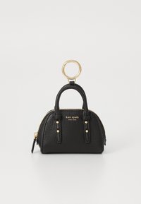 Small black pebbled leather Kate Spade handbag keychain with double handles, gold zipper, studs, and large gold keyring attachment.