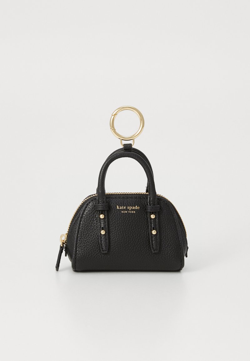 Small black pebbled leather Kate Spade handbag keychain with double handles, gold zipper, studs, and large gold keyring attachment.