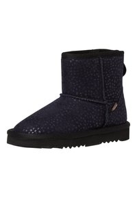 Bottes chelsea bleu marine avec une surface texturée, bout rond, garniture noire et une semelle en caoutchouc solide présentant un motif en zigzag.