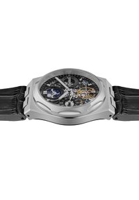 Zegarek skeleton z bezowym stalowym przypadkiem, czarnym teksturowanym skórzanym paskiem i czarną tarczą ukazującą skomplikowane złote mechaniczne elementy.