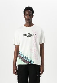 White cotton t-shirt featuring "STONE" logo in black, with pastel graphic design in pink and blue, and textured accents on the bottom.