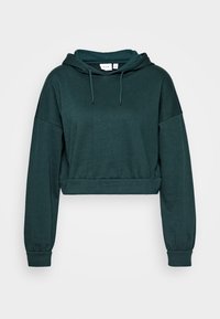 Sudadera verde recortada con capucha ajustable, mangas largas y puños acanalados. Fabricada con un tejido suave y de textura lisa.