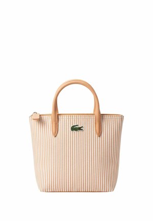 Petit sac cabas avec rayures verticales beige et blanches, poignées couleur cuir clair, fermeture éclair et logo crocodile vert sur le devant.