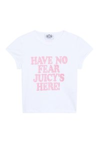 T-shirt en coton blanc avec un texte rose vif et scintillant : "N'AYEZ PAS PEUR JUICY EST ICI !" Manches courtes et encolure ronde.
